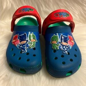 CROCS Blue and Red Kids Slippers with Character Accents